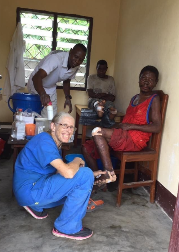 Sarah Smiling and treating patient